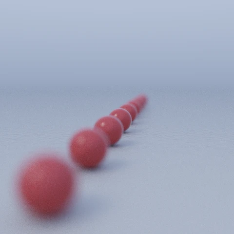 Nine repeated spheres receding into the distance, with only the ones near the focal plane sharp and the rest thrown out of focus.