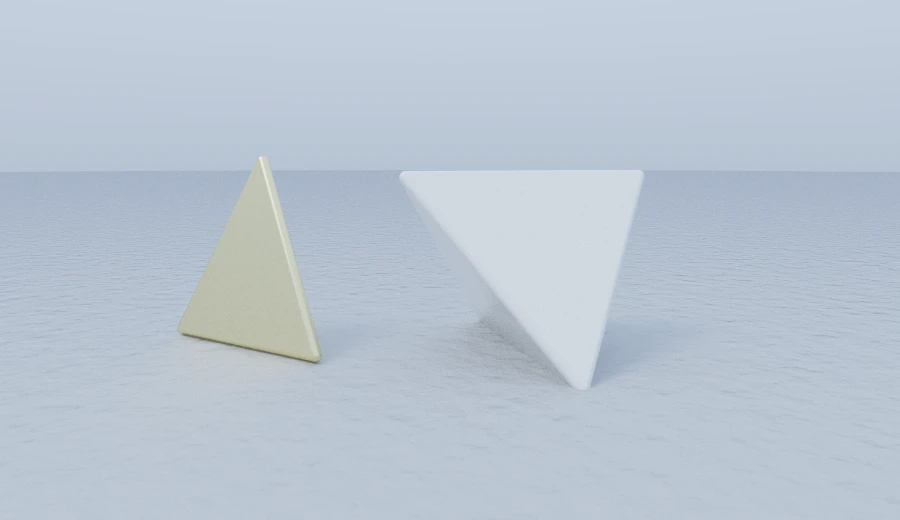 A brass triangular fin turned towards the camera so its thickness reads, beside a ceramic tetrahedron standing on one point — one face, and a list of four.
