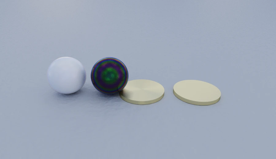 An iridescent film and a brushed metal, the grain smearing the highlight in one direction only.
