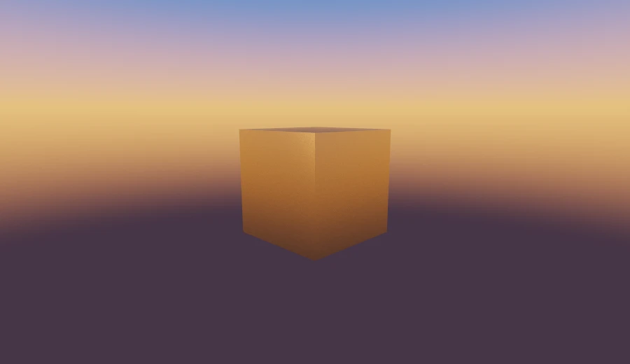 A solid brass cube turned forty-five degrees, against a sunset sky.